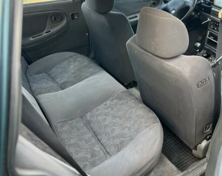 Зелений Деу Нексія, об'ємом двигуна 1.5 л та пробігом 200 тис. км за 899 $, фото 6 на Automoto.ua