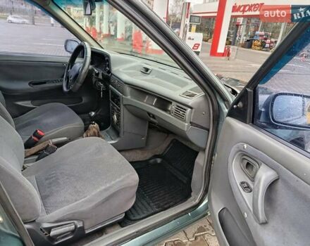 Зеленый Дэу Нексия, объемом двигателя 1.5 л и пробегом 119 тыс. км за 1799 $, фото 2 на Automoto.ua