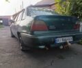 Зелений Деу Нексія, об'ємом двигуна 1.5 л та пробігом 300 тис. км за 1000 $, фото 4 на Automoto.ua