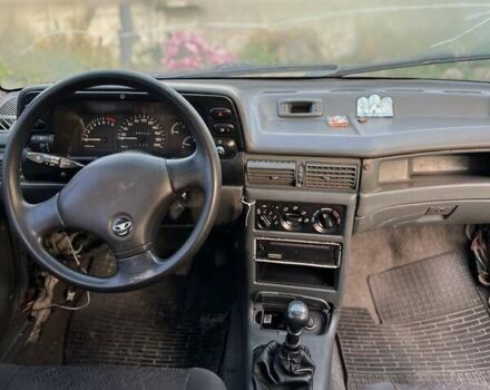 Зелений Деу Нексія, об'ємом двигуна 1.5 л та пробігом 200 тис. км за 899 $, фото 4 на Automoto.ua