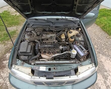 Зеленый Дэу Нексия, объемом двигателя 1.5 л и пробегом 119 тыс. км за 1300 $, фото 3 на Automoto.ua