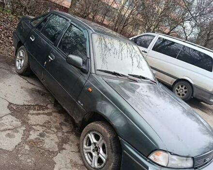 Зелений Деу Нексія, об'ємом двигуна 1.5 л та пробігом 330 тис. км за 1000 $, фото 4 на Automoto.ua