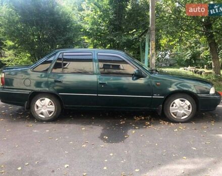 Зеленый Дэу Нексия, объемом двигателя 1.5 л и пробегом 252 тыс. км за 1300 $, фото 1 на Automoto.ua