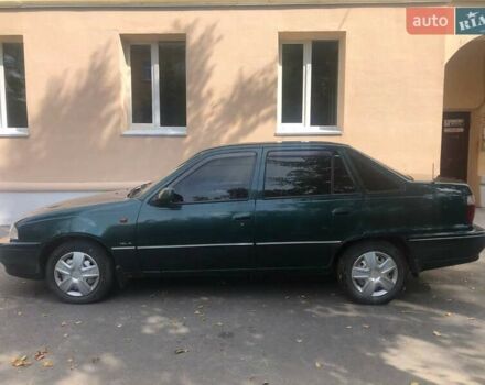Зеленый Дэу Нексия, объемом двигателя 1.5 л и пробегом 252 тыс. км за 1300 $, фото 2 на Automoto.ua