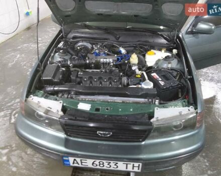Зелений Деу Нексія, об'ємом двигуна 1.5 л та пробігом 150 тис. км за 3100 $, фото 11 на Automoto.ua