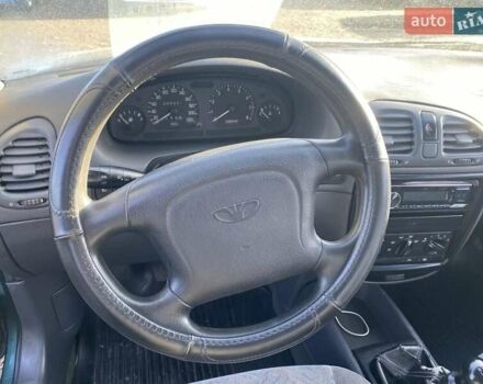 Зелений Деу Нексія, об'ємом двигуна 1.6 л та пробігом 225 тис. км за 1100 $, фото 18 на Automoto.ua