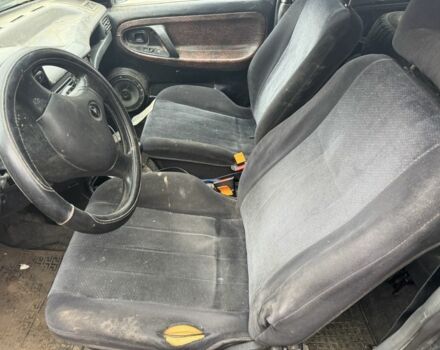 Зелений Деу Нексія, об'ємом двигуна 1.5 л та пробігом 300 тис. км за 450 $, фото 7 на Automoto.ua