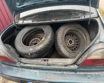 Зелений Деу Нексія, об'ємом двигуна 1.5 л та пробігом 300 тис. км за 450 $, фото 10 на Automoto.ua