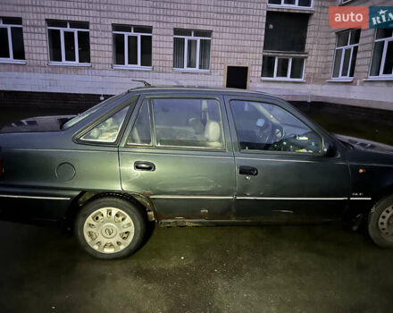 Зеленый Дэу Нексия, объемом двигателя 1.5 л и пробегом 169 тыс. км за 900 $, фото 6 на Automoto.ua