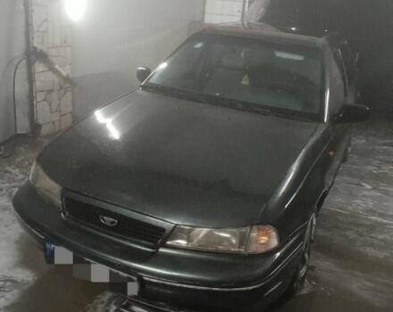 Зеленый Дэу Нексия, объемом двигателя 1.5 л и пробегом 291 тыс. км за 1300 $, фото 3 на Automoto.ua