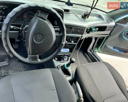 Зеленый Дэу Нексия, объемом двигателя 1.5 л и пробегом 341 тыс. км за 2500 $, фото 12 на Automoto.ua