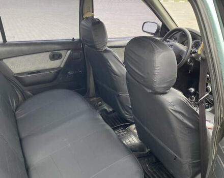 Зеленый Дэу Нексия, объемом двигателя 1.6 л и пробегом 128 тыс. км за 2700 $, фото 9 на Automoto.ua