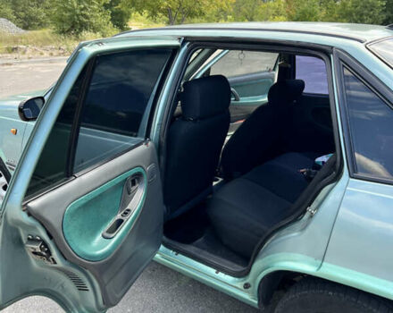 Зеленый Дэу Нексия, объемом двигателя 1.5 л и пробегом 341 тыс. км за 2500 $, фото 9 на Automoto.ua