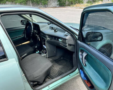 Зеленый Дэу Нексия, объемом двигателя 1.5 л и пробегом 341 тыс. км за 2500 $, фото 7 на Automoto.ua