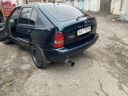 Зеленый Дэу Нексия, объемом двигателя 1.5 л и пробегом 208 тыс. км за 1300 $, фото 1 на Automoto.ua