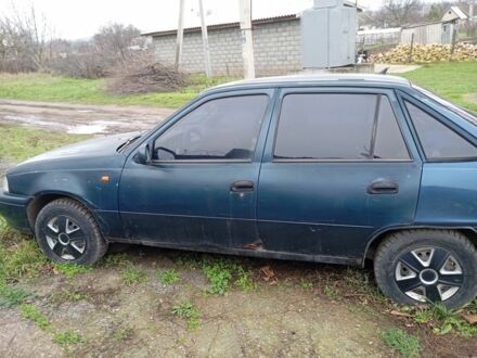 Зелений Деу Нексія, об'ємом двигуна 1.5 л та пробігом 300 тис. км за 591 $, фото 1 на Automoto.ua