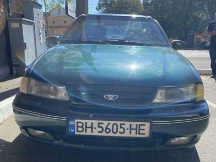 Зелений Деу Нексія, об'ємом двигуна 1.5 л та пробігом 397 тис. км за 1350 $, фото 1 на Automoto.ua