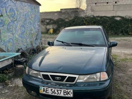 Зелений Деу Нексія, об'ємом двигуна 1.5 л та пробігом 200 тис. км за 899 $, фото 1 на Automoto.ua