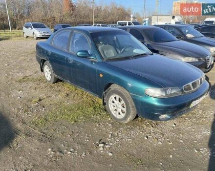 Зелений Деу Нексія, об'ємом двигуна 1.6 л та пробігом 225 тис. км за 1100 $, фото 1 на Automoto.ua