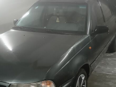 Зеленый Дэу Нексия, объемом двигателя 1.5 л и пробегом 291 тыс. км за 1300 $, фото 1 на Automoto.ua