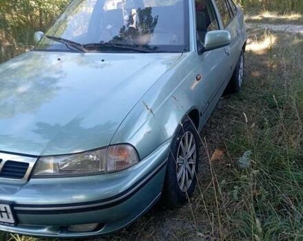 Зелений Деу Нексія, об'ємом двигуна 1.5 л та пробігом 200 тис. км за 2150 $, фото 1 на Automoto.ua