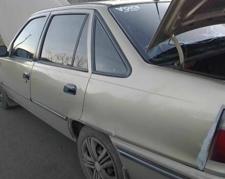 Помаранчевий Деу Нексія, об'ємом двигуна 1.5 л та пробігом 187 тис. км за 1800 $, фото 4 на Automoto.ua