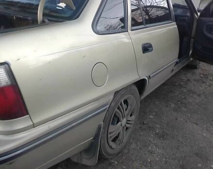 Помаранчевий Деу Нексія, об'ємом двигуна 1.5 л та пробігом 187 тис. км за 1800 $, фото 6 на Automoto.ua