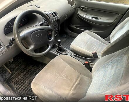 Белый Дэу Нубира, объемом двигателя 1.6 л и пробегом 200 тыс. км за 1850 $, фото 7 на Automoto.ua