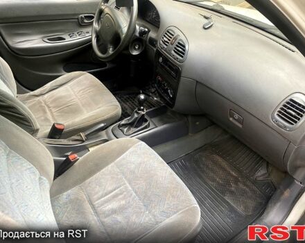 Белый Дэу Нубира, объемом двигателя 1.6 л и пробегом 200 тыс. км за 1850 $, фото 6 на Automoto.ua