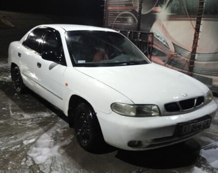 Белый Дэу Нубира, объемом двигателя 1.6 л и пробегом 235 тыс. км за 650 $, фото 1 на Automoto.ua