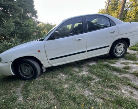 Білий Деу Нубіра, об'ємом двигуна 1.6 л та пробігом 370 тис. км за 1200 $, фото 3 на Automoto.ua