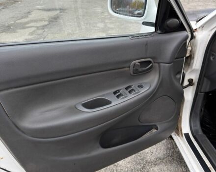 Білий Деу Нубіра, об'ємом двигуна 1.6 л та пробігом 300 тис. км за 650 $, фото 9 на Automoto.ua