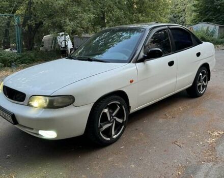 Белый Дэу Нубира, объемом двигателя 1.6 л и пробегом 373 тыс. км за 2100 $, фото 36 на Automoto.ua