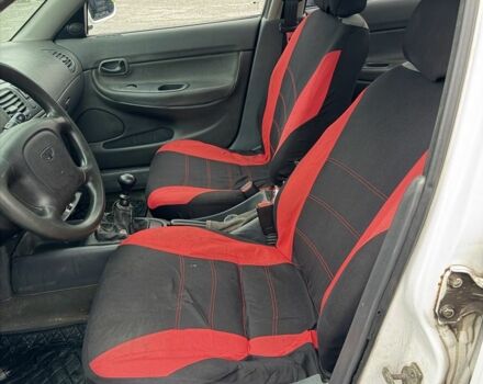 Білий Деу Нубіра, об'ємом двигуна 1.6 л та пробігом 300 тис. км за 650 $, фото 8 на Automoto.ua