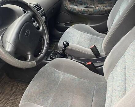 Белый Дэу Нубира, объемом двигателя 1.6 л и пробегом 281 тыс. км за 1600 $, фото 5 на Automoto.ua