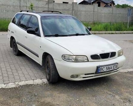 Белый Дэу Нубира, объемом двигателя 2 л и пробегом 253 тыс. км за 1500 $, фото 22 на Automoto.ua