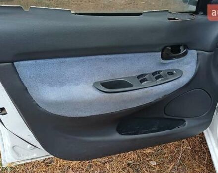 Белый Дэу Нубира, объемом двигателя 1.6 л и пробегом 349 тыс. км за 900 $, фото 22 на Automoto.ua