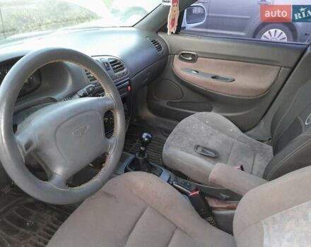 Білий Деу Нубіра, об'ємом двигуна 2 л та пробігом 300 тис. км за 1600 $, фото 7 на Automoto.ua