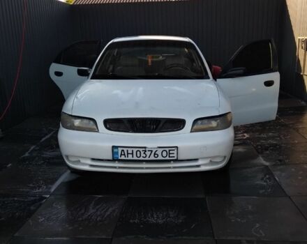 Білий Деу Нубіра, об'ємом двигуна 1.6 л та пробігом 203 тис. км за 1150 $, фото 1 на Automoto.ua