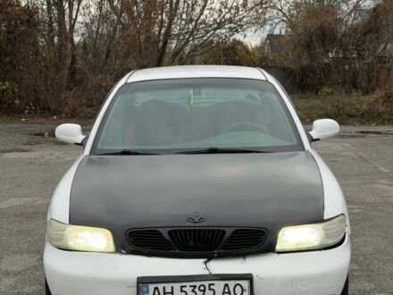 Белый Дэу Нубира, объемом двигателя 1.6 л и пробегом 300 тыс. км за 650 $, фото 1 на Automoto.ua