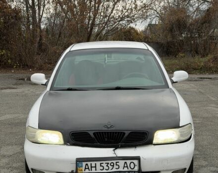 Белый Дэу Нубира, объемом двигателя 1.6 л и пробегом 300 тыс. км за 650 $, фото 1 на Automoto.ua