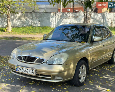 Бежевый Дэу Нубира, объемом двигателя 2 л и пробегом 220 тыс. км за 2200 $, фото 1 на Automoto.ua