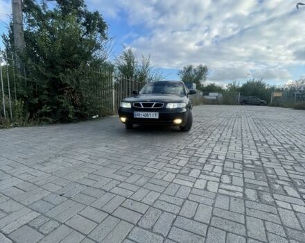 Черный Дэу Нубира, объемом двигателя 1.6 л и пробегом 258 тыс. км за 2000 $, фото 1 на Automoto.ua