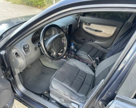 Черный Дэу Нубира, объемом двигателя 1.6 л и пробегом 258 тыс. км за 2000 $, фото 9 на Automoto.ua