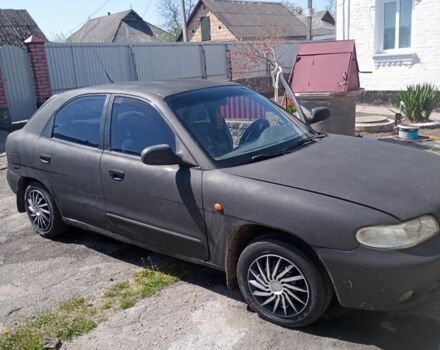 Черный Дэу Нубира, объемом двигателя 1.6 л и пробегом 230 тыс. км за 700 $, фото 9 на Automoto.ua