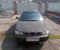 Черный Дэу Нубира, объемом двигателя 1.6 л и пробегом 230 тыс. км за 790 $, фото 1 на Automoto.ua