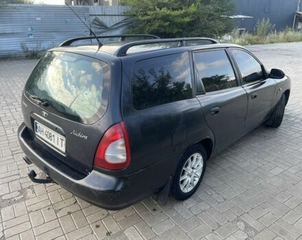 Черный Дэу Нубира, объемом двигателя 1.6 л и пробегом 258 тыс. км за 2000 $, фото 3 на Automoto.ua