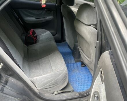 Черный Дэу Нубира, объемом двигателя 1.6 л и пробегом 235 тыс. км за 700 $, фото 4 на Automoto.ua