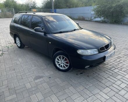 Черный Дэу Нубира, объемом двигателя 1.6 л и пробегом 258 тыс. км за 2000 $, фото 4 на Automoto.ua