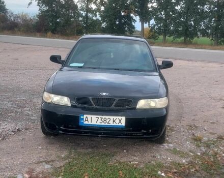 Черный Дэу Нубира, объемом двигателя 1.6 л и пробегом 503 тыс. км за 1313 $, фото 1 на Automoto.ua